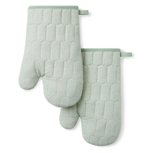 Quilted mint green oven mitts with darker mint green trim