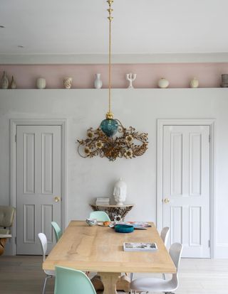 A dining room with matching, muted interiors