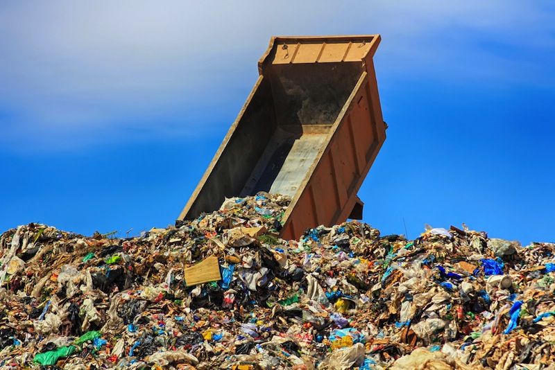 Trash truck at landfill