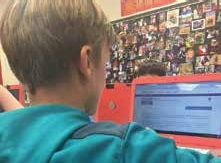 A sixth-grade student at Troy Intermediate School works on StudySync.