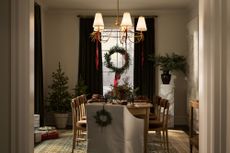 a dining room decorated for christmas