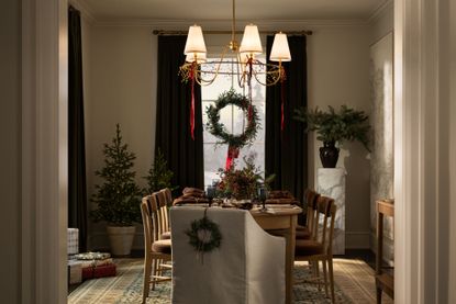 a dining room decorated for christmas