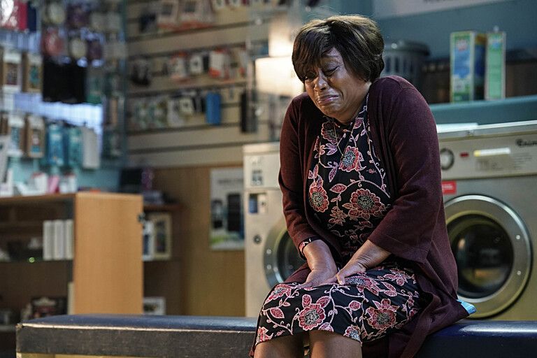 EastEnders Yolande in the launderette distressed