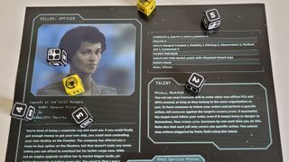 Alien: The Roleplaying Game character card and dice