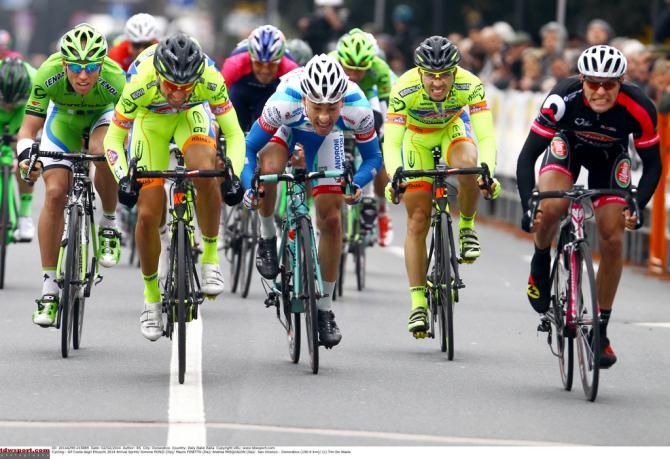 Simone Ponzi edged out teamate Mauro Finetto to claim his first win of 2014