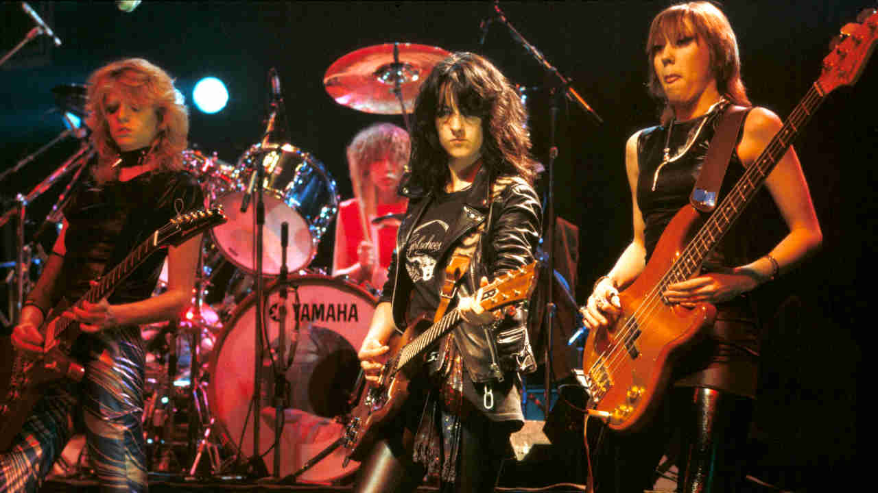 Girlschool posing for a photograph in the early 1980s
