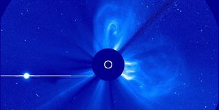 This image of a coronal mass ejection (CME) was captured on April 20, 2013. The CME is headed in the direction of Mercury. The large bright spot on the left is Venus.