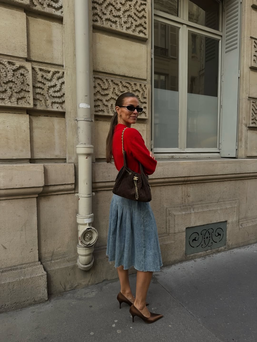 polliani wearing a pop of red