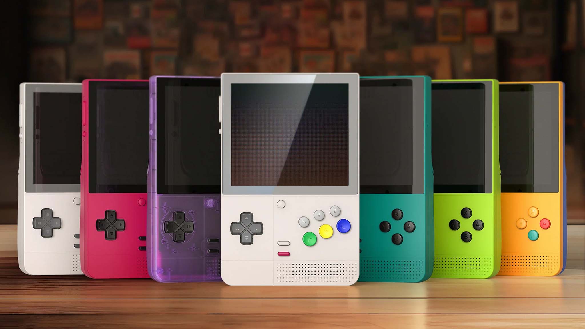 Seven Retroid Pocket Classic handhelds standing upright on a table, each a different color.