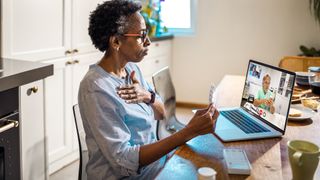 woman on a video call with her doctor