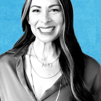 headshot of stacy london in black and white overlaid on blue background for she pivots podcast
