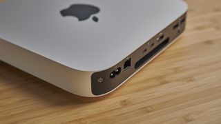 Apple Mac mini (M1, 2020) on a wooden desk