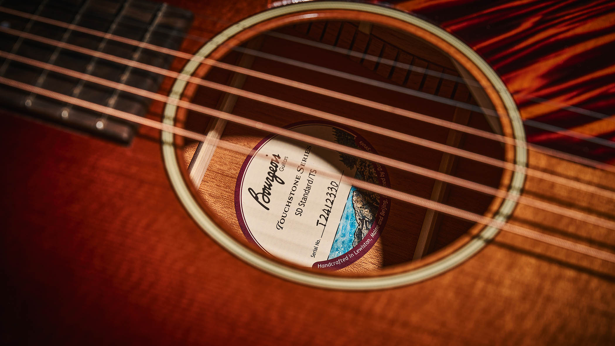 Bourgeois Slope D Standard T/S: Inspired by the J-45, this Touchstone series acoustic has. a beautiful high-gloss finish with a tiger-stripe pickguard
