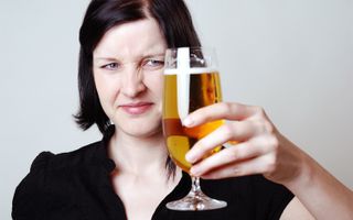 Woman holding beer