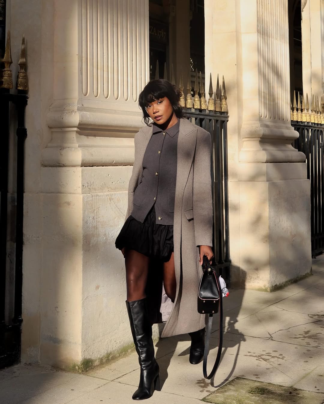 Andi in skirt and long coat