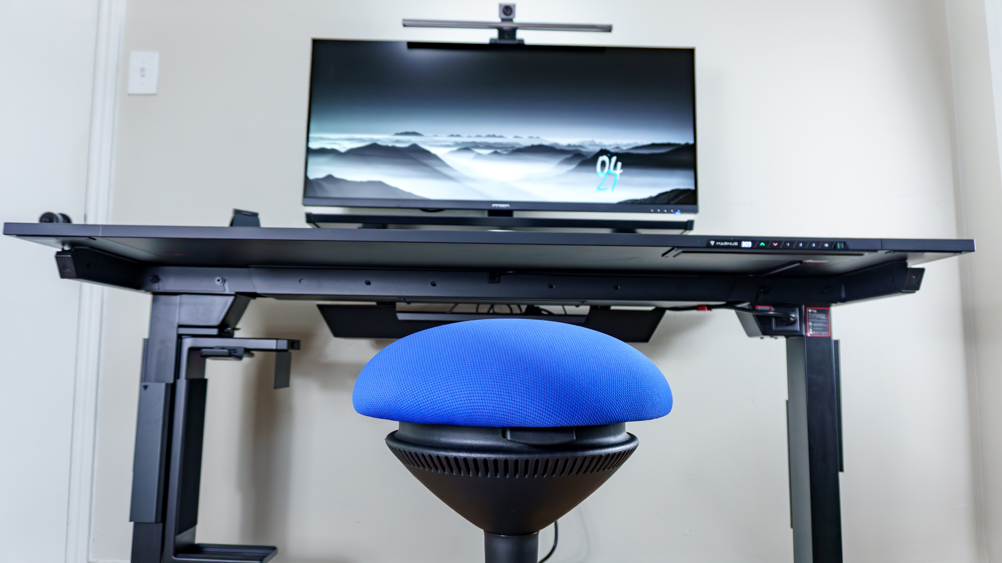 A close-up shot of a wobble stool in front of a desk