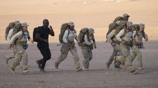 Recruits with Director Staff Remi running in the desert in Special Forces: World's Toughest Test
