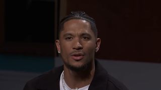 Josh Hart asks a question while sitting in the audience on SNL.
