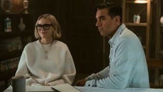Dean (Bobby Cannavale) and Nora (Naomi Watts) sit together, the two leads in The Watcher cast