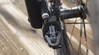 A view of a mountain bike brake caliper and brake pads