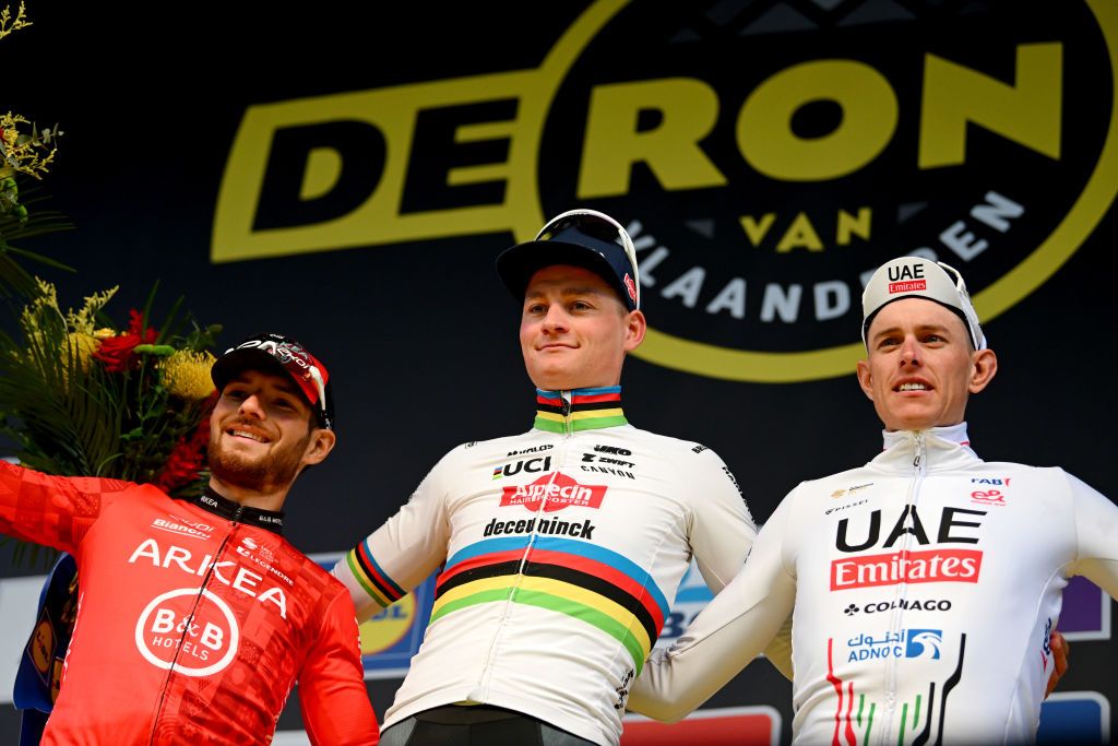 OUDENAARDE BELGIUM MARCH 31 LR Luca Mozzato of Italy and Team Arkea BB Hotels on second place race winner Mathieu van der Poel of The Netherlands and Team Alpecin Deceuninck and Nils Politt of Germany and UAE Team Emirates on third place pose on the podium ceremony after the the 108th Ronde van Vlaanderen Tour des Flandres 2024 Mens Elite a 2708km one day race from Antwerpen to Oudenaarde UCIWT on March 31 2024 in Oudenaarde Belgium Photo by Dario BelingheriGetty Images