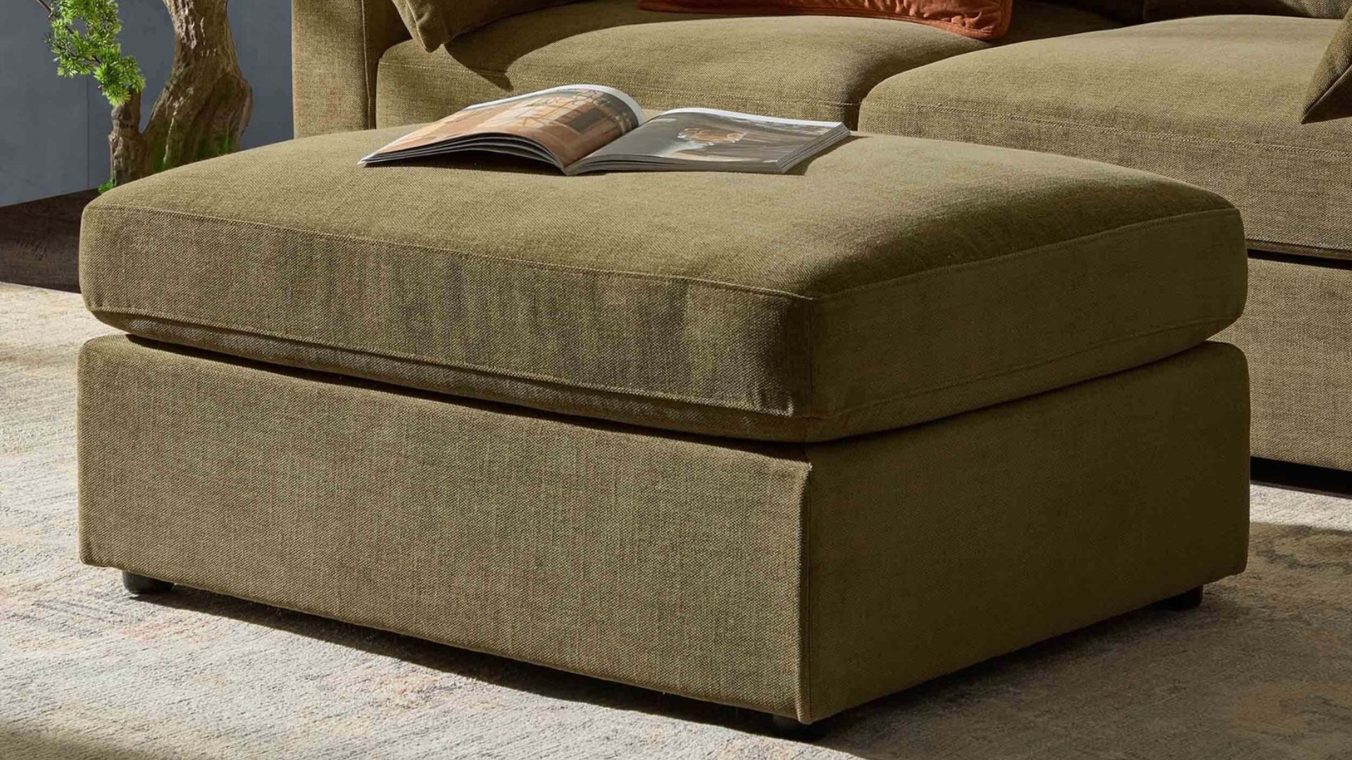 Deep green ottoman with storage