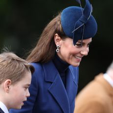 Catherine, Princess of Wales and Britain's Prince George of Wales leave after attending the Royal Family's traditional Christmas Day service at St Mary Magdalene Church on the Sandringham Estate in eastern England, on December 25, 2023.