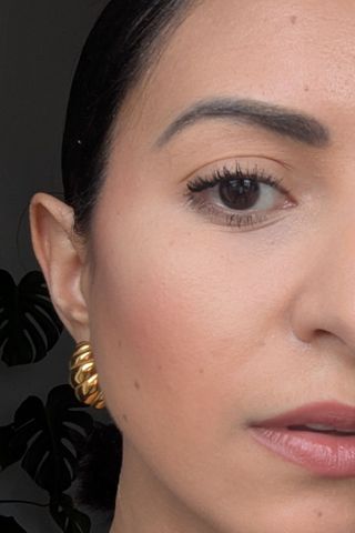 a close up of the new benefit bounce mascara on jazzria harris