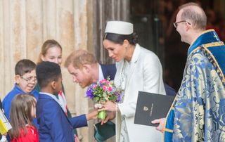 Meghan and Harry meeting children