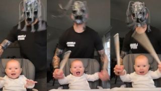Baby and father drum to Slipknot