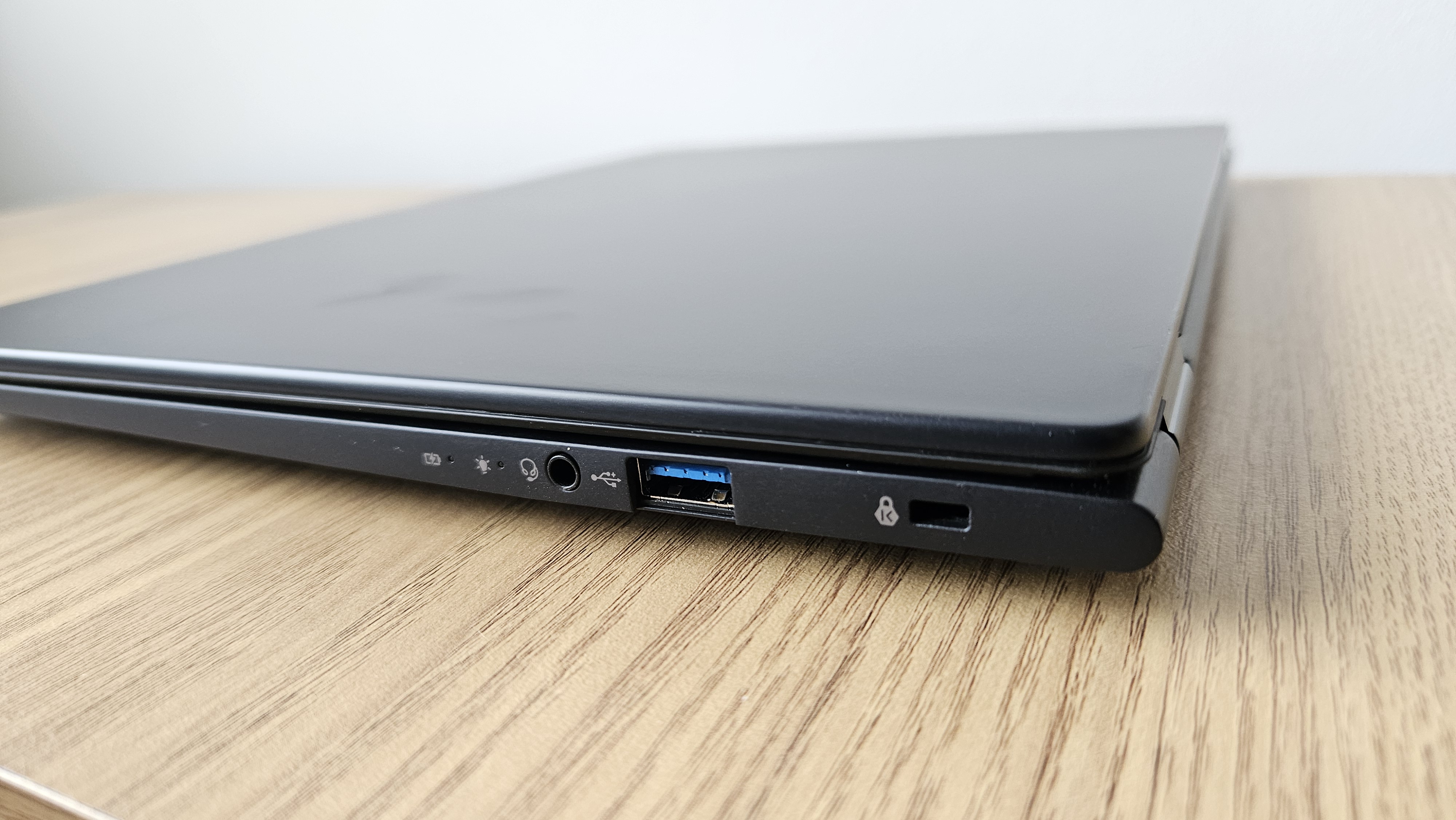 The Acer TravelMate P6 14 AI on a desk