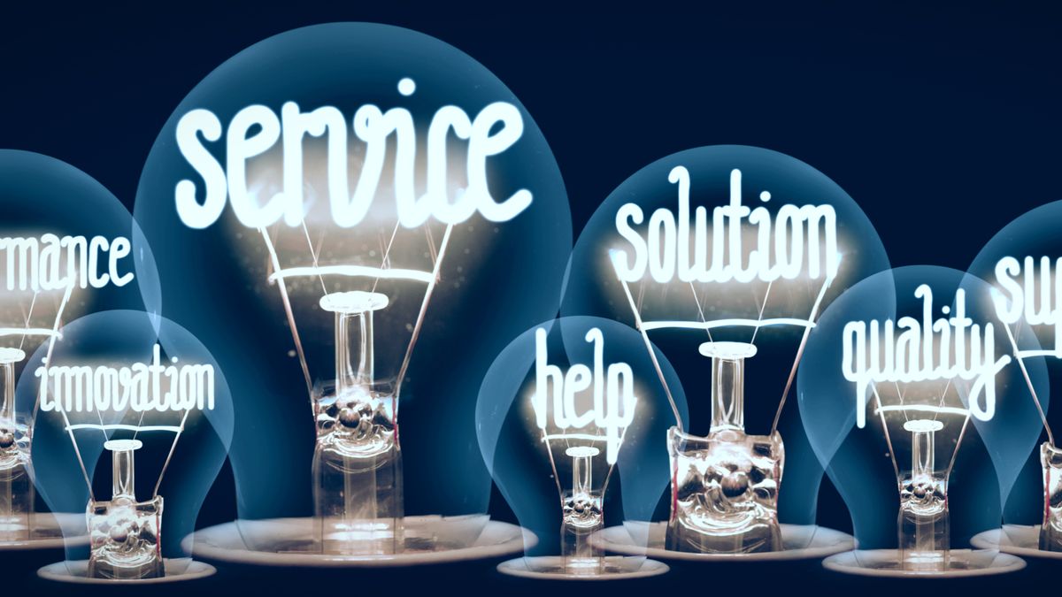 Lightbulbs with the words &amp;#039;service&amp;#039;, &amp;#039;solution&amp;#039;, &amp;#039;help&amp;#039;, &amp;#039;innovation&amp;#039;, and &amp;#039;quality in them