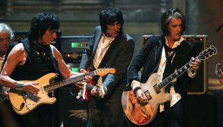 (from left) Jeff Beck, Ronnie Wood, and Joe Perry perform at the 24th Annual Rock and Roll Hall of Fame Induction Ceremony on April 4, 2009 at the Public Hall in Cleveland, Ohio