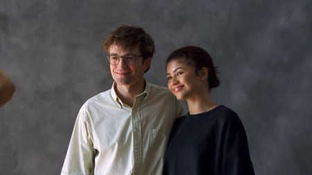 Robert Pattinson and Zendaya smiling in The Drama
