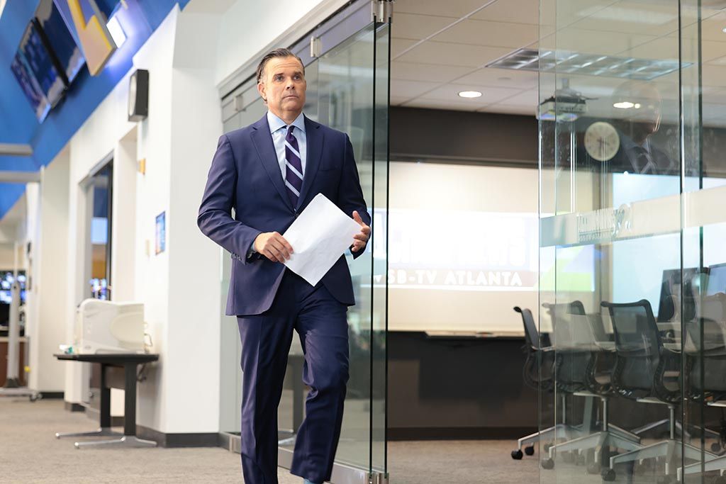 Justin Farmer, 4 and 6 p.m. anchor at WSB Atlanta, and son of the late Don Farmer of CNN, gets ready to report for the Cox Media Group station. 