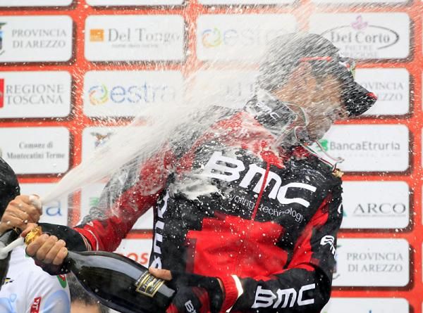 Alessandro Ballan gets a blast of champagne from Giro della Toscana runner-up Carlos Betancur.