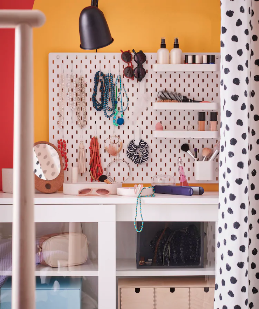 Walk-in wardrobe in small bedroom