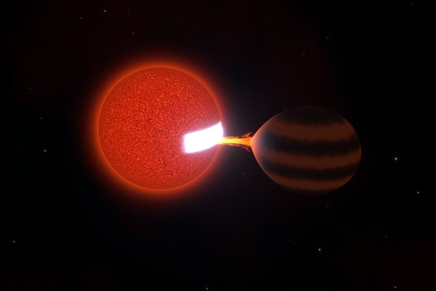 A orange and black sphere next to a brown and white sphere there is a trail of orange and red smoke connecting the two