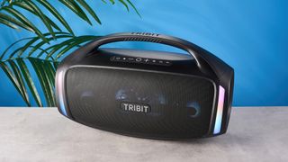 the tribit stormbox blast 2 bluetooth speaker, 18 inches long and weighing 19 pounds, with multicolored LED lights and a carry handle