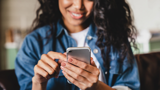 Woman looking at phone screen