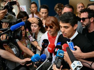 Gisele Pélicot and her lawyer arrive at court