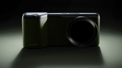 The Xiaomi 13 Ultra, shown with a camera grip accessory