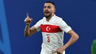 Turkey's Merih Demiral celebrates scoring against Austria at Euro 2024.