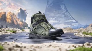 Spartan-green boots sit in front of a backdrop from Halo Infinite