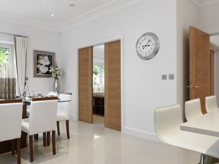 Doors in living space by JB Kind