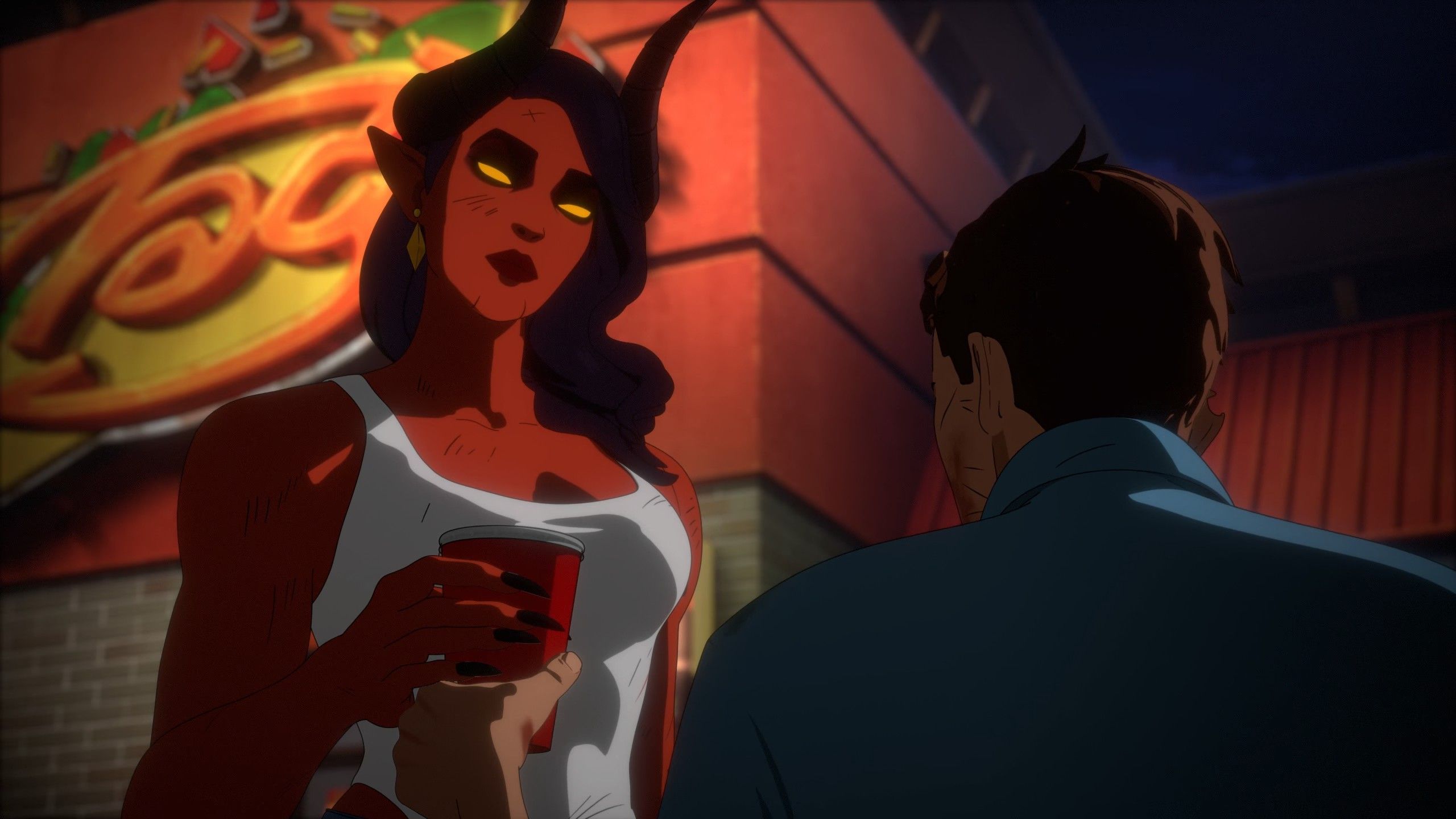 Malevola hands over a drink in a red cup