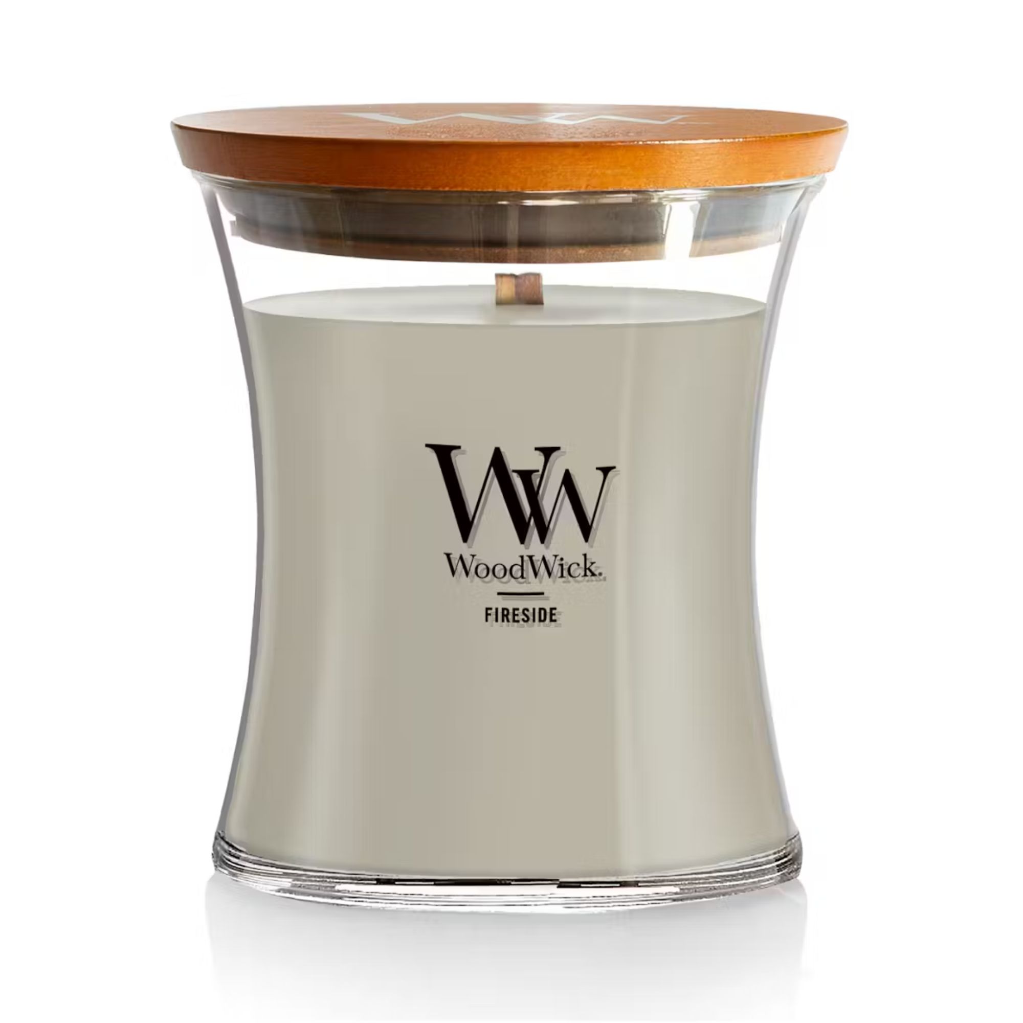 Gray candle in glass jar with wooden lid