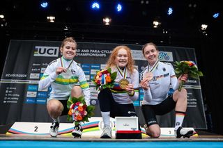 Picture by Alex WhiteheadSWpixcom 28092024 2024 UCI Road and Paracycling Road World Championships Zurich Switzerland Womens U23 Road Race Podium Puck Pieterse Netherlands on the podium receiving the Gold Medal to become World Champion Neve Bradbury Australia receiving the Silver Medal and Antonia Niedermaier Germany receiving the Bronze Medal