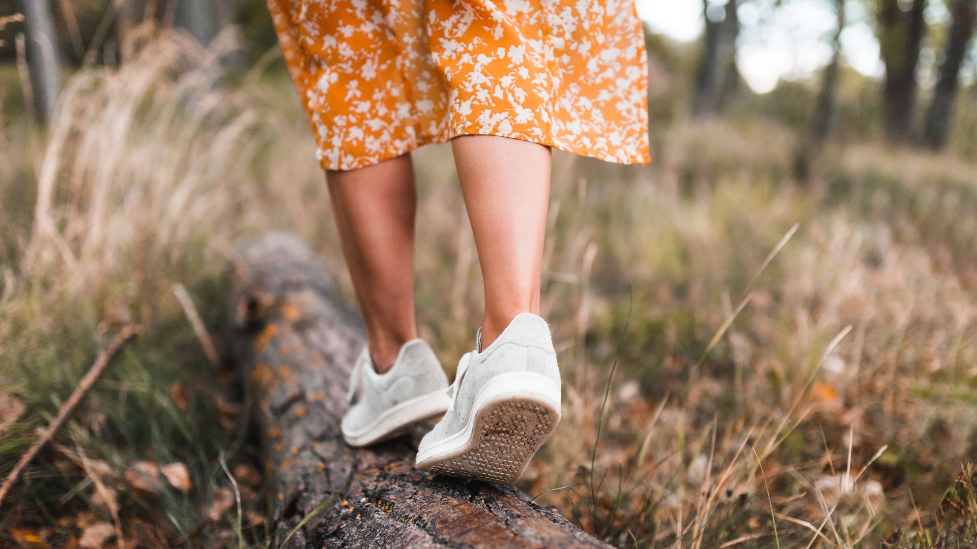 Woman with bare legs walking in nature