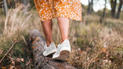 Woman with bare legs walking in nature